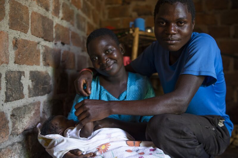 Mama Kits mother and father with baby in Uganda