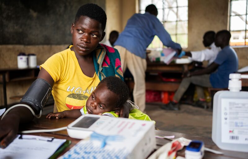 Winnie and Child Receiving Medical Care